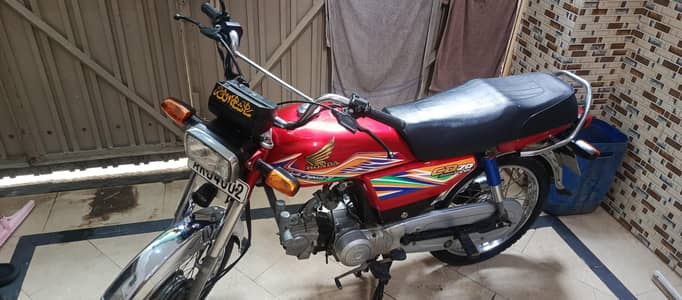 honda 70cc red