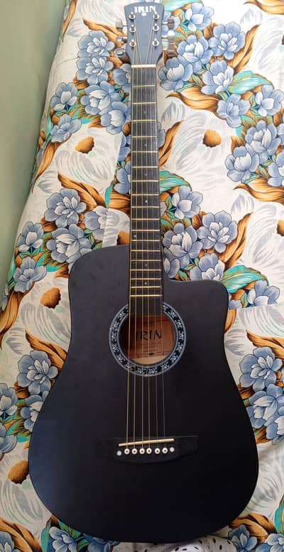 Acoustic guitar (2 months used)