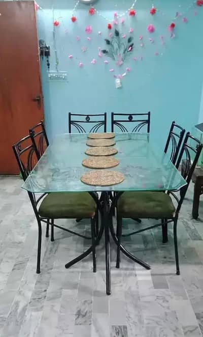 Glass table with 5 chairs