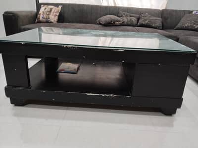 Title: Modern Wooden Center Table with Glass Top – Good Condition