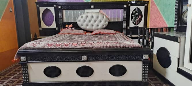 bed, dressing and showcase is for sale