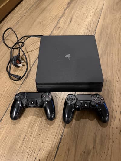 PlayStation Slim 1TB with 2 controllers
