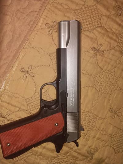 toy gun metal plus plastic