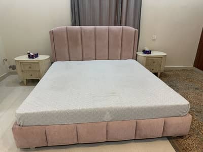 Less than one year used bed in boucle cloth