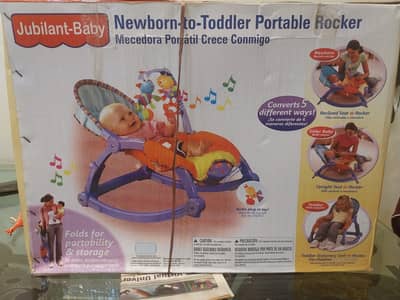 Packed Brand New Newborn to Toddler Portable Rocker. . .