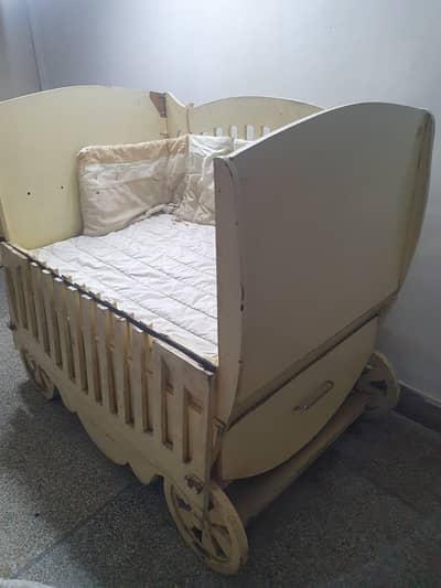 A customise huge baby cot with mattress and accessories