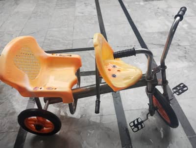double seat tricycle for kids 2 to 6 years.