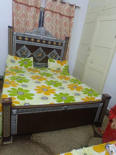 wooden double bed