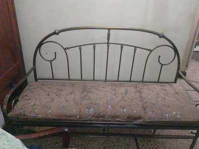Iron sofa good condition. 3 to 4 mens can sit easily  3 large cusions