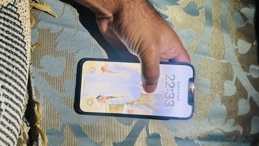 12 pro 3 all ok original month  sim working kary gi