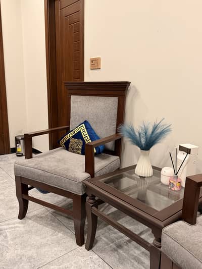 2 wooden chairs with table