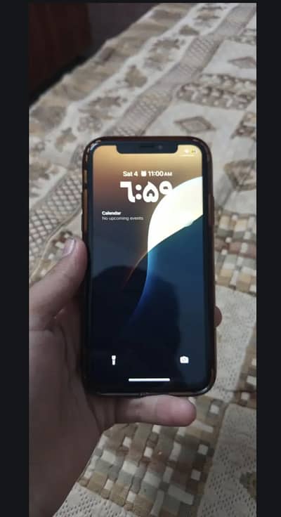 iPhone XS, Face ID True Tone Active.
