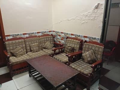 5 seater wood in sofa and table