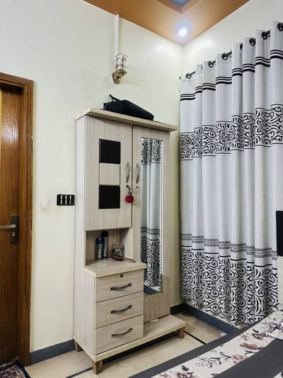 Bed (without mattress) and dressing tablej