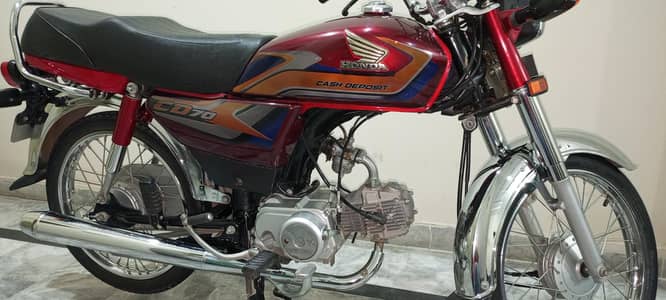 honda CD70 red colour.