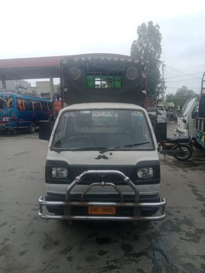 I am selling Suzuki pickup total genuine only call no SMS