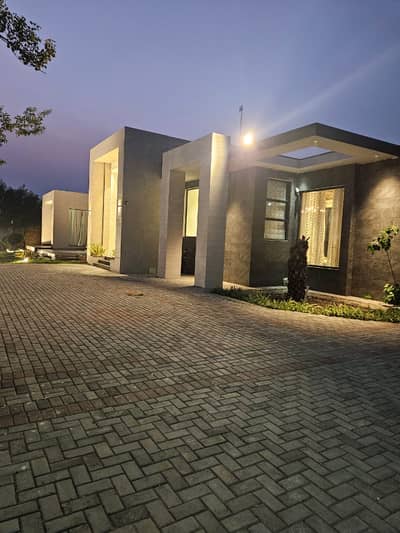 "A Slice Of Paradise: 8-Kanal Swiss Farmhouse With Stunning Views, Large Pool, And Green Lawn On Bedian Road For Sale With Easy Deal Through EMPIRE Estate"