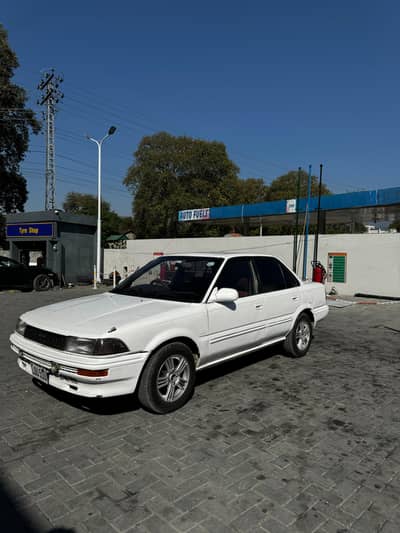toyota Corolla SE saloon 1988 maroon enterior