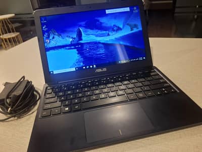 Asus notebook modle 205t with charger
