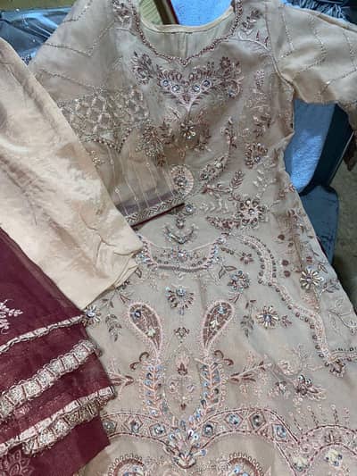 new fancy suit very beautiful cut work on it light peach colour shirt