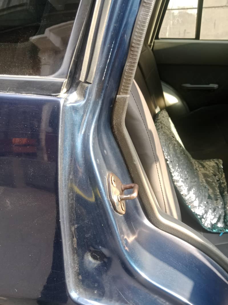 چھت ڈگی جان باقی ساری پینٹ ہے گاڑی میں کسی قسم کا کوئی کام نہیں ہے 8