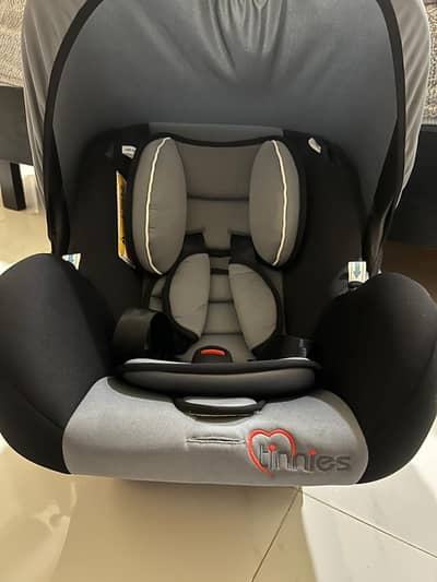 Tinnies Baby Carrier Car Seat.