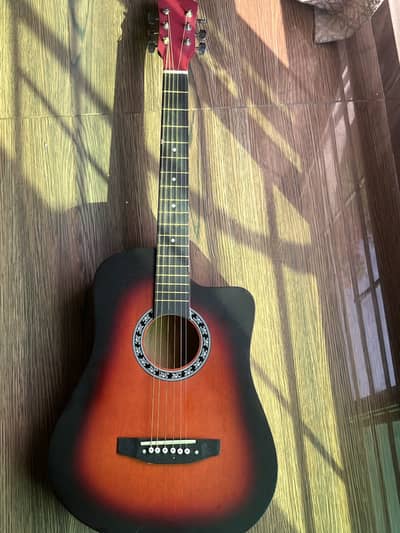 Barely used guitar with accessories