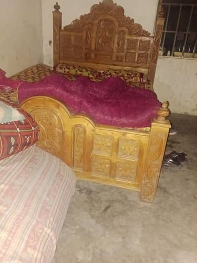 This is a real bed made of wood from Bihar