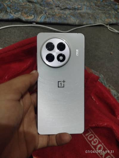 One plus 13r non PTA completely box with charger urgent for sale
