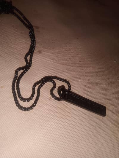 Chain for boys in new and fresh condition with free handgripper
