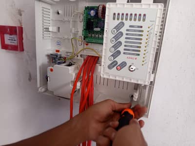 workers required for fire alarm system