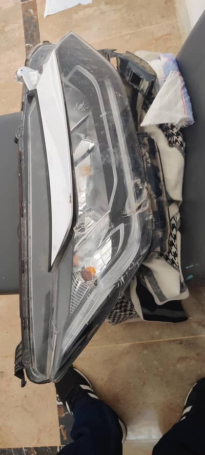 Honda city head light broken. . right side. original