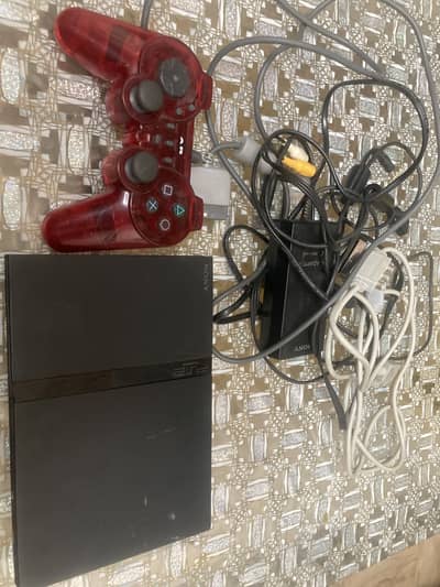 PS2 with controller and all wires , games and cd