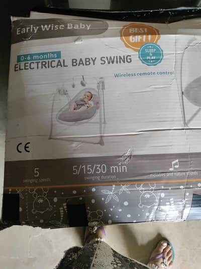 electrical baby swing li8 brown ND white.  colour