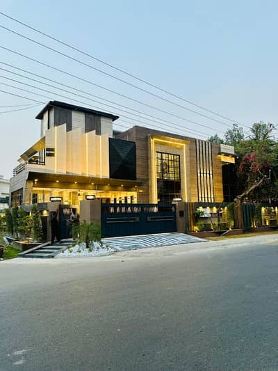 Ultra-Luxury 22 Marla Corner House on 100 Ft Road!  Experience elite living in this magnificent 6-bedroom