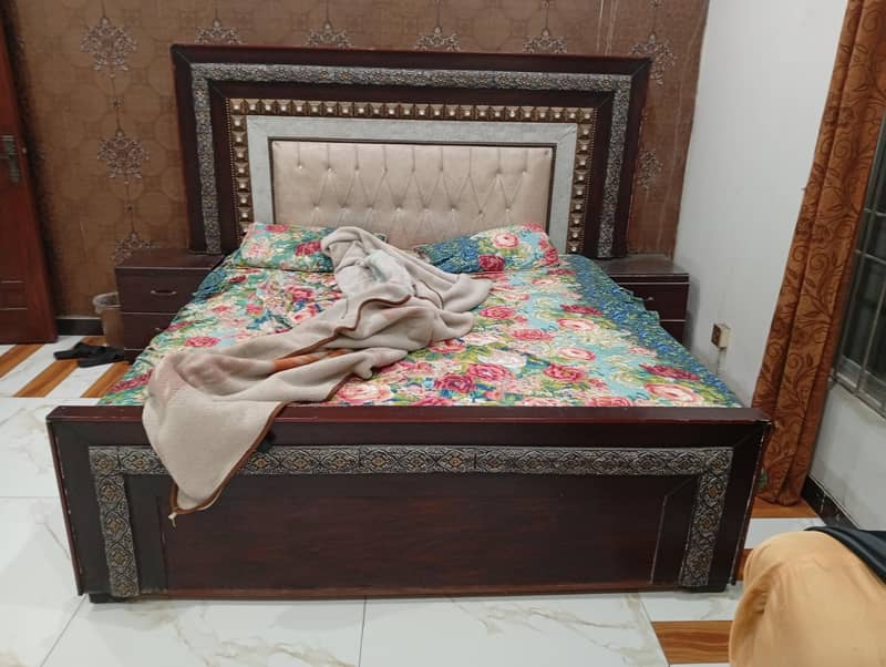 bed and side table 0