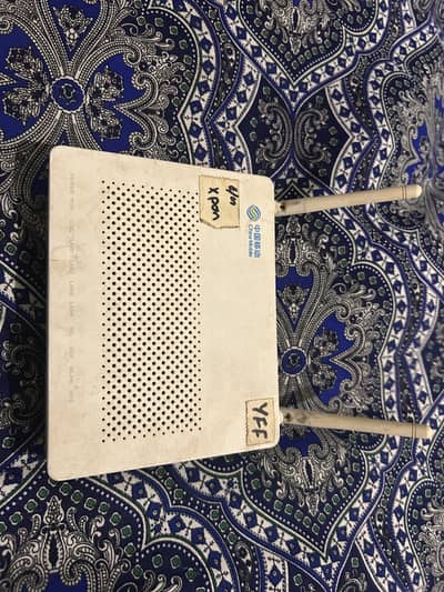 Huawei router with latest firmware update and in working condition.