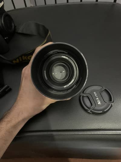 Nikon D750 with strap orignal battery charge 50 mm prime lenz