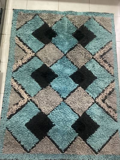 Black, ferozi and grey rug