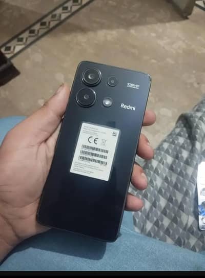 redmi note 13 with 10/10 condition. front fingerprint