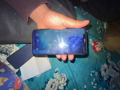 I phone 12 non pta {sim time available}