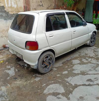 Automatic Daihatsu Coure 2003 model