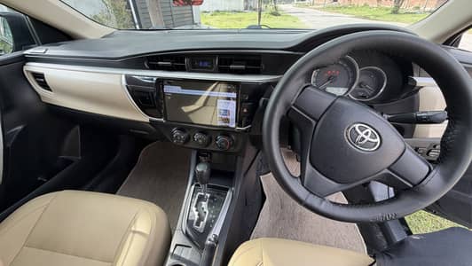 2016 Corolla Gli black total Genuine