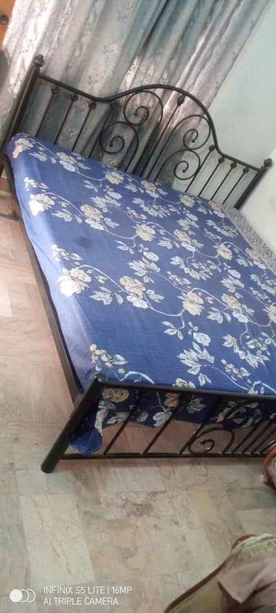Used Metal double bed  with metres