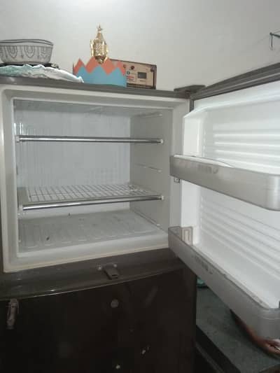 large size fridge good condition  with stablizer 2000waat
