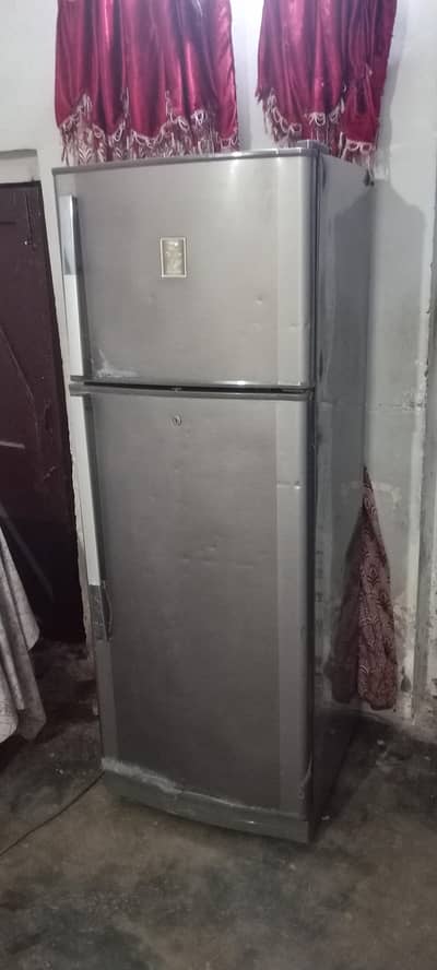 medium size fridge good condition