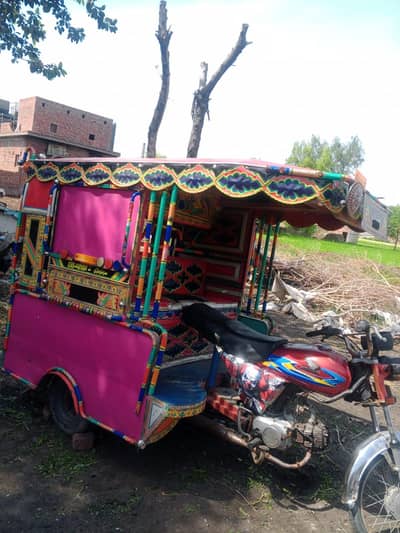 chingchi rikhshaw with moterbike