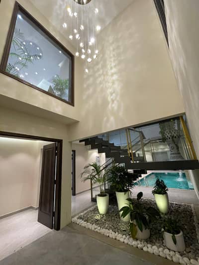 Architect Design Brand New Semi Furnish 6 Bedroom 500 Square Yards Bungalow With Theatre In Basement And Swimming Pool Is Available For Sale In Sought Out Zone B Of DHA Phase 8 Before 26th Street