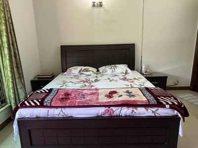 Bed with side tables