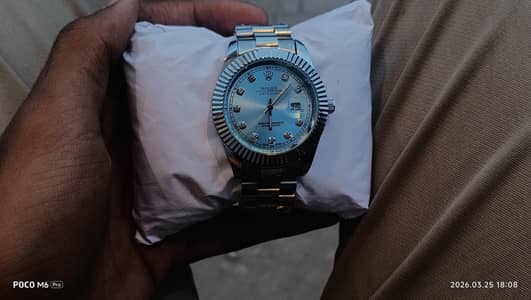 Rolex watch with date